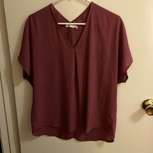 Dark rose colored dolman sleeved blouse